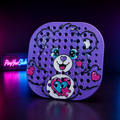 Égouttoir Ourson violet Ninja SLUSHi MAX sur fond néon